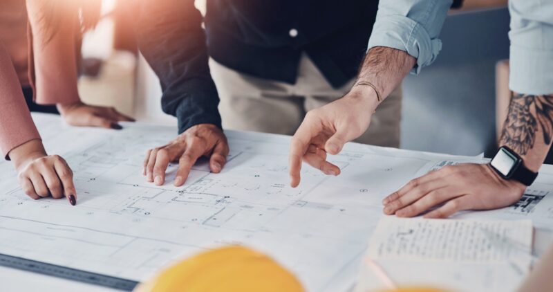 Hands,,Architect,And,Blueprint,Sketch,With,Clients,For,Floor,Plan,